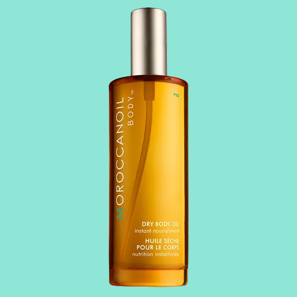 Bottle of Moroccanoil Dry Body Oil with a pump dispenser, instant moisture body oil, fragrance originale.