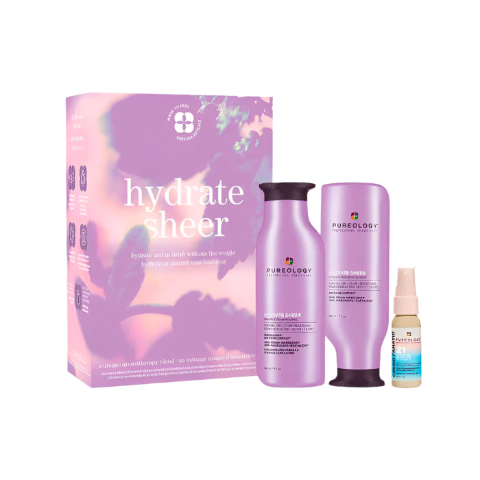 A product image featuring the Pureology Hydrate Sheer Spring Kit which includes a shampoo, conditioner, and a bottle of essence, all presented alongside a box with the product branding.