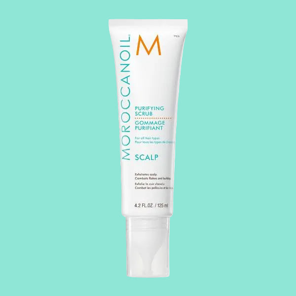 Moroccanoil Purifying Scrub tube on a white background