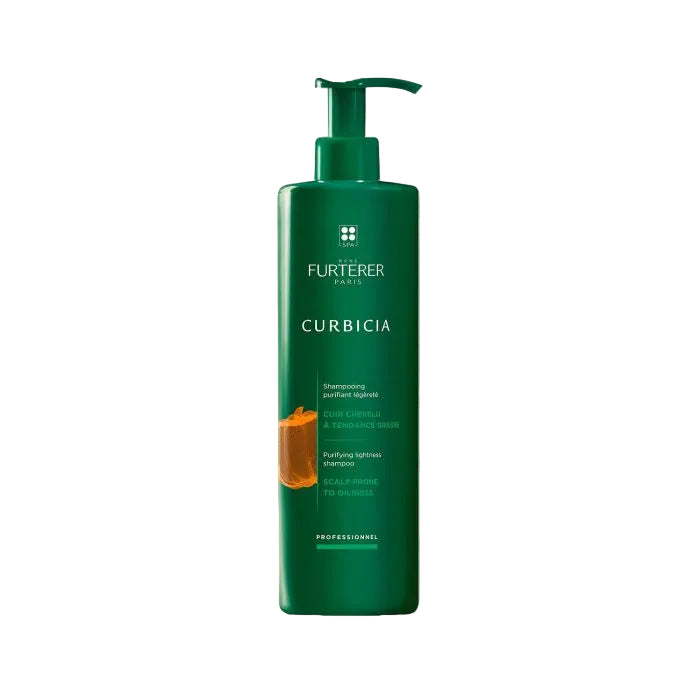 Green shampoo bottle with pump labeled 'Curbicia'