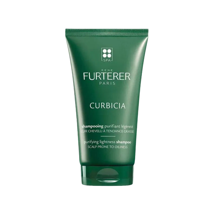 Green shampoo bottle with Furterer