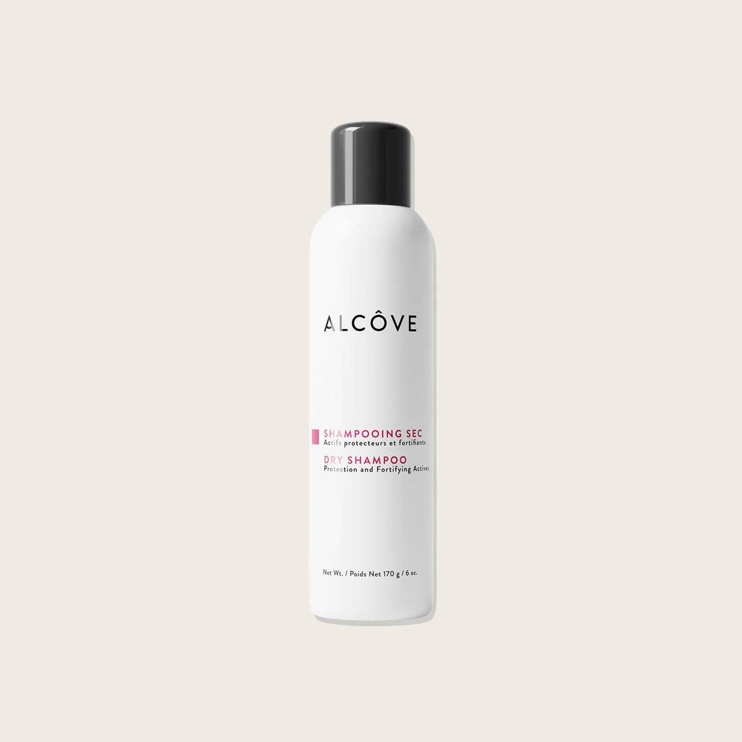 Alcove dry shampoo bottle on a light beige background