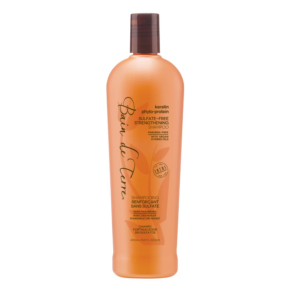 Bottle of Bain de Terre shampoo on a white background
