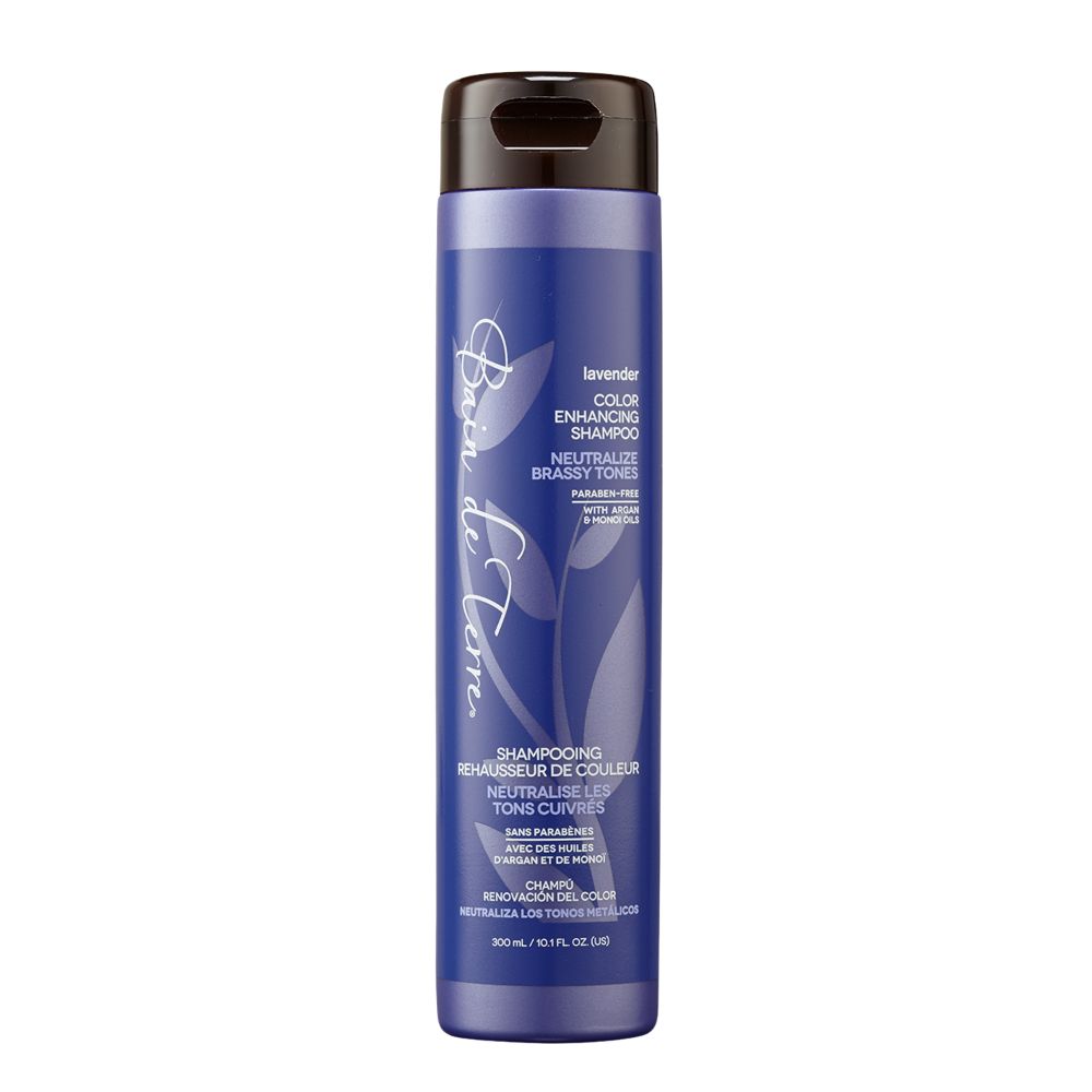 Blue shampoo bottle with black cap on a white background