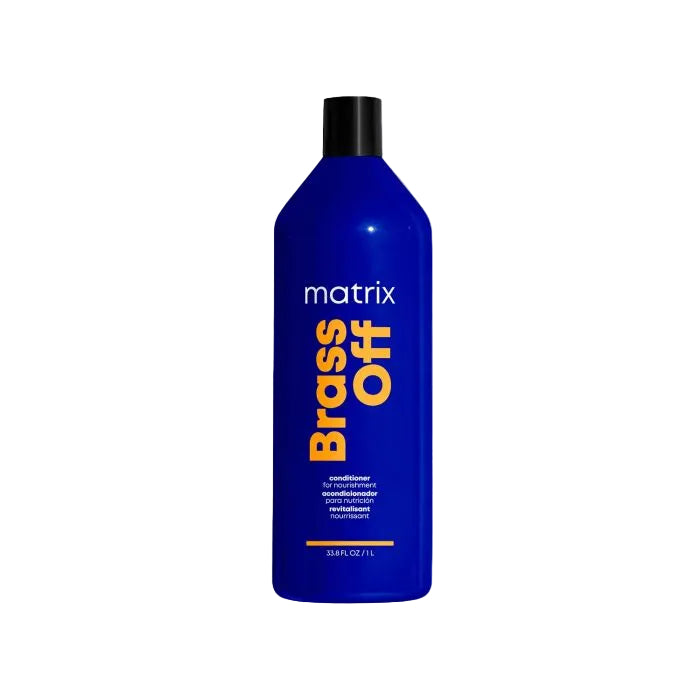 Blue bottle of Matrix Brass Off conditioner on a white background