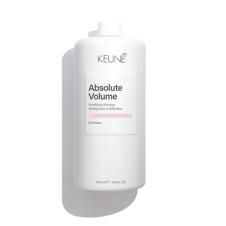 Keune Absolute Volume shampoo bottle on a 