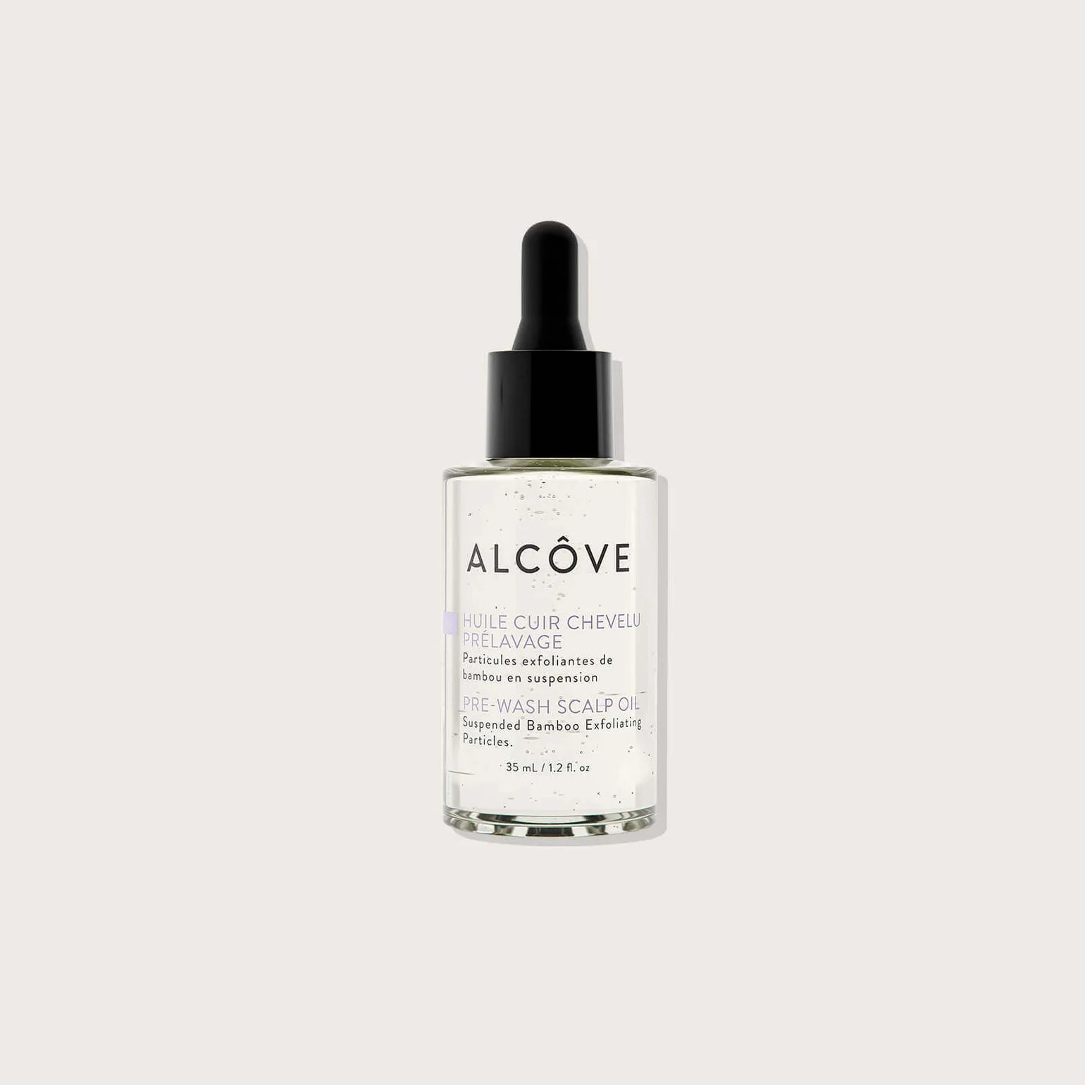 Alcove hair care product bottle on a white background