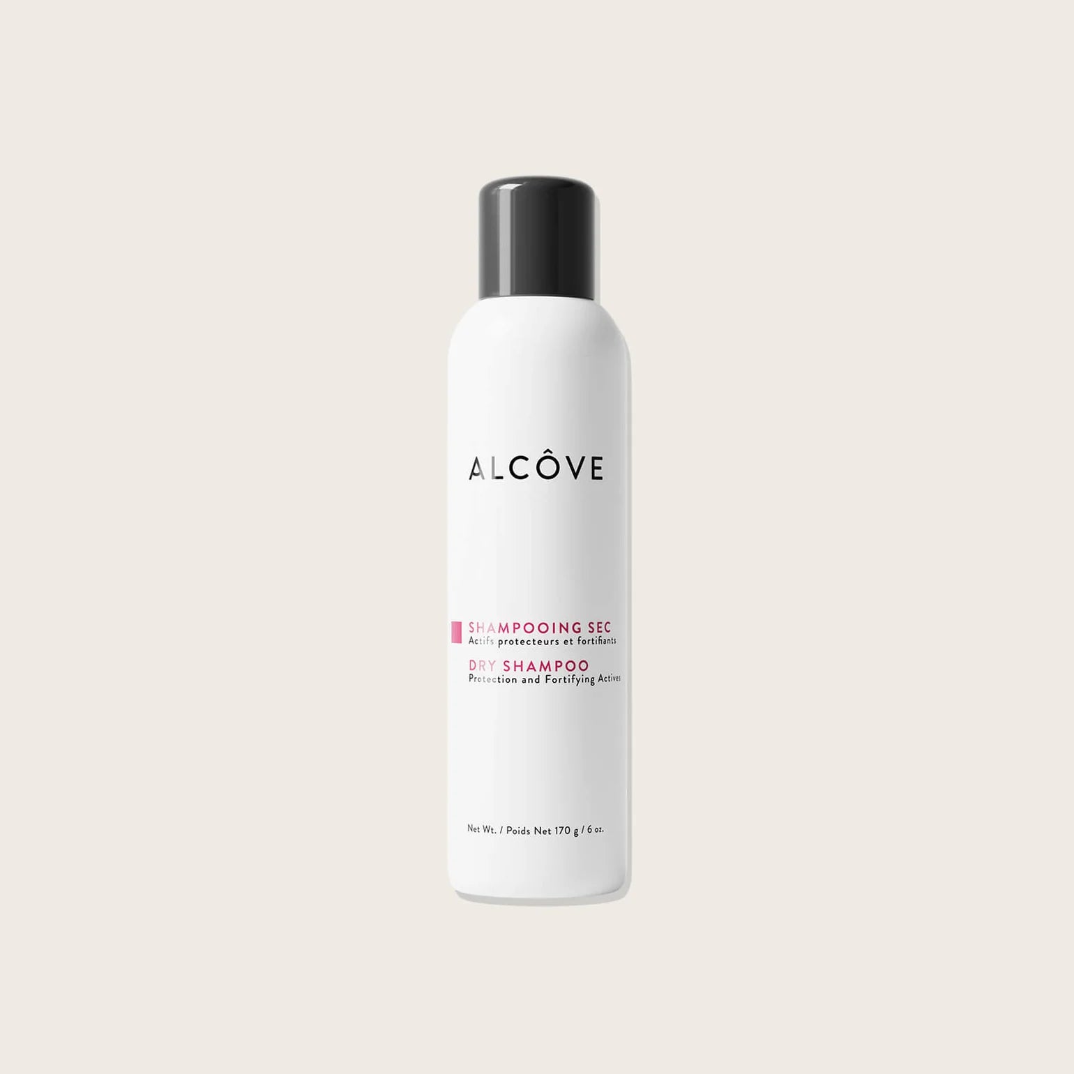 Alcove dry shampoo bottle on a light beige background