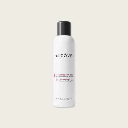 Alcove dry shampoo bottle on a light beige background