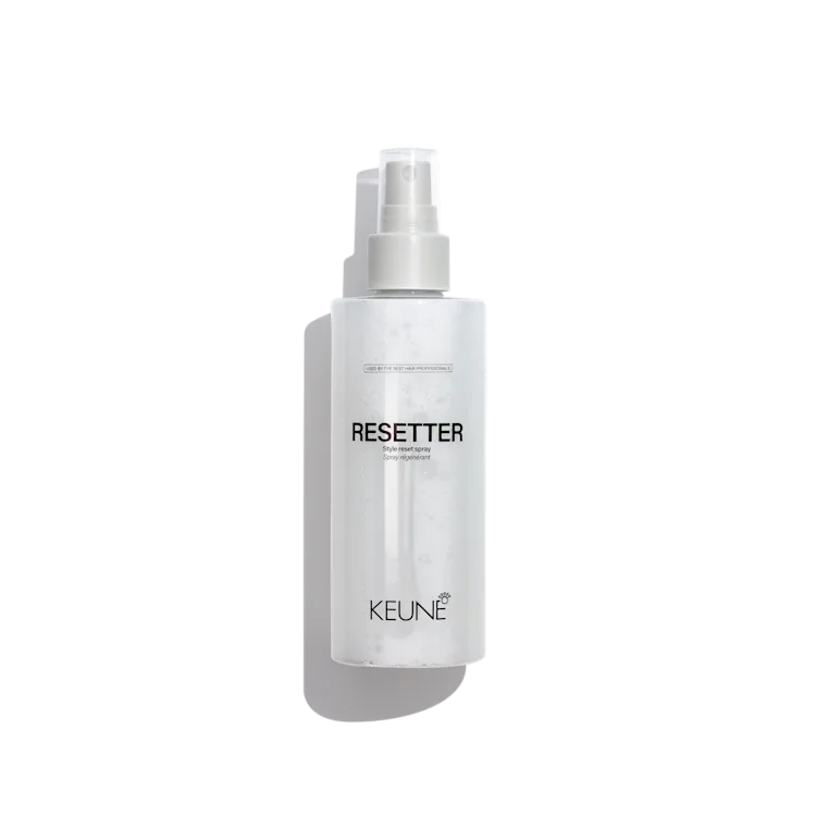 Keune Resetter spray bottle on a white background
