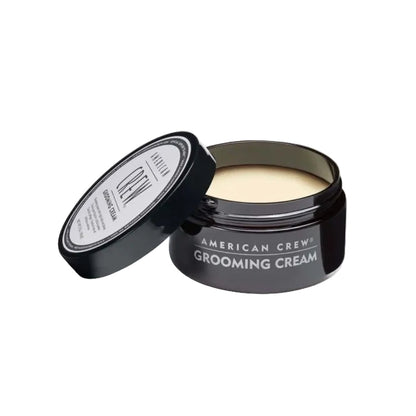 American Crew grooming cream jar on a white background