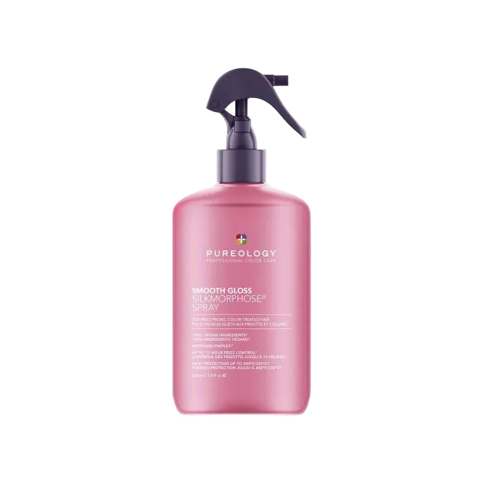 Pink bottle with a spray nozzle on a white background
