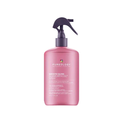 Pink bottle with a spray nozzle on a white background