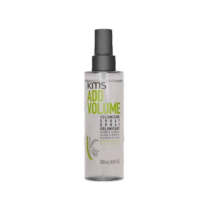 KMS Add Volume Volumizing Spray in a clear bottle with a dark gray spray nozzle, shown against a white background with a faint repeating watermark pattern.