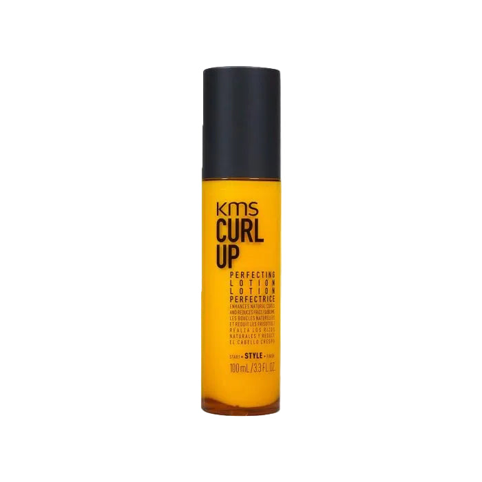 KMS Curl Up Perfecting Lotion in a 100ml amber bottle with a black cap, shown against a white background with a faint repeating watermark pattern.