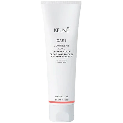 A tube of Keune Care Confident Curl Leave In Curly hair styling cream.