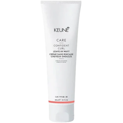 A tube of Keune Care Confident Curl Leave In Wavy hair styling product.